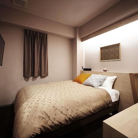 Okayama Square Hotel Plus Esterno foto