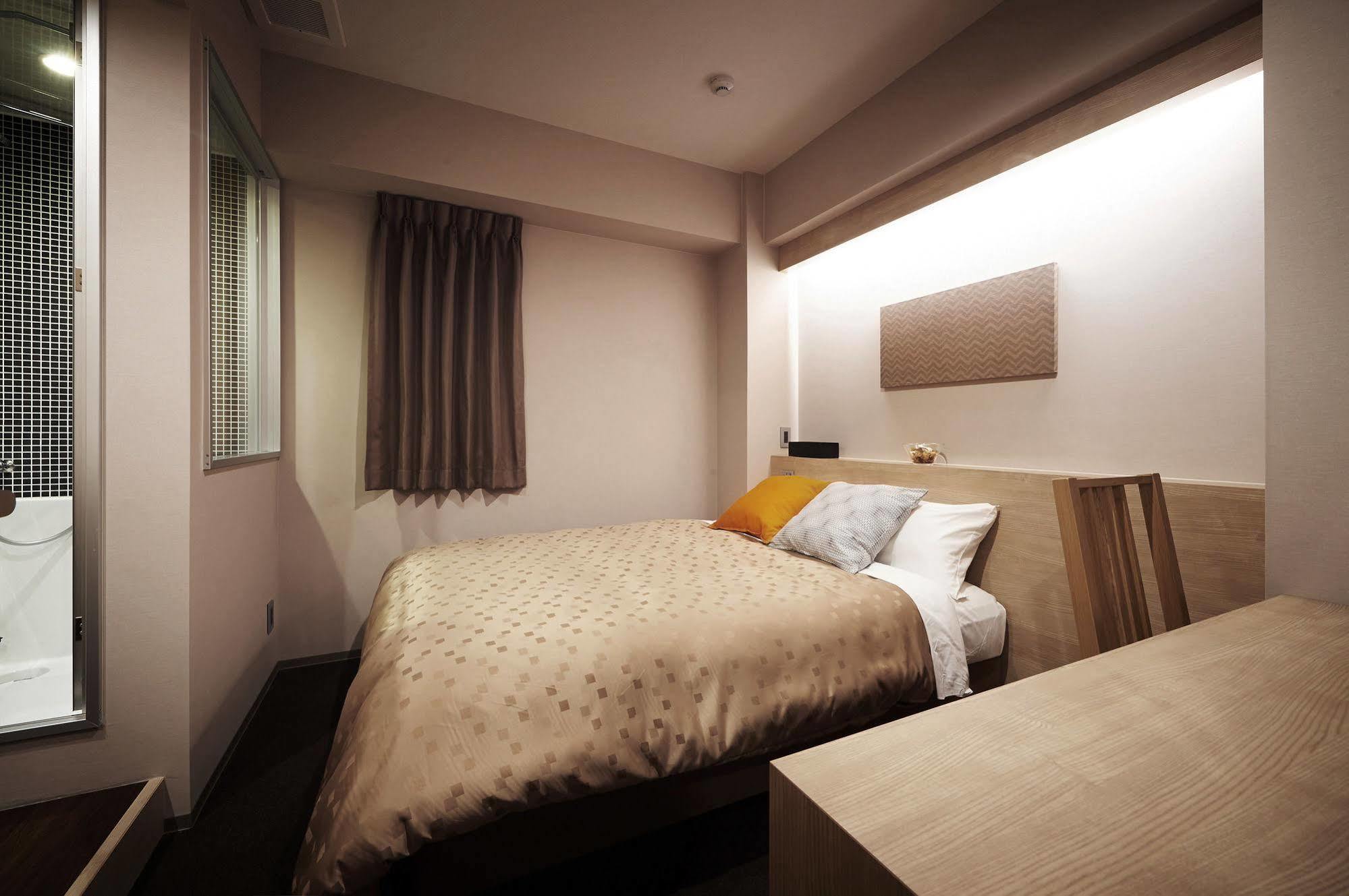 Okayama Square Hotel Plus Esterno foto