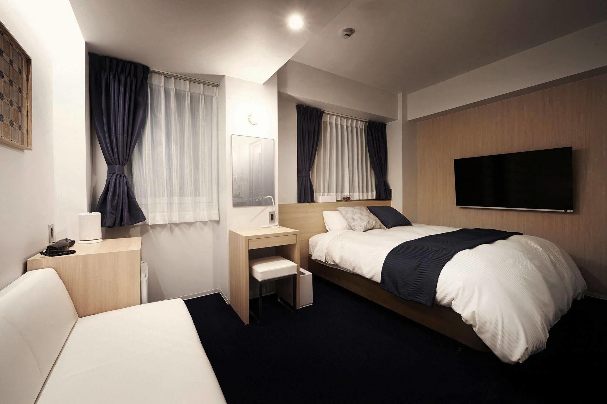 Okayama Square Hotel Plus Esterno foto