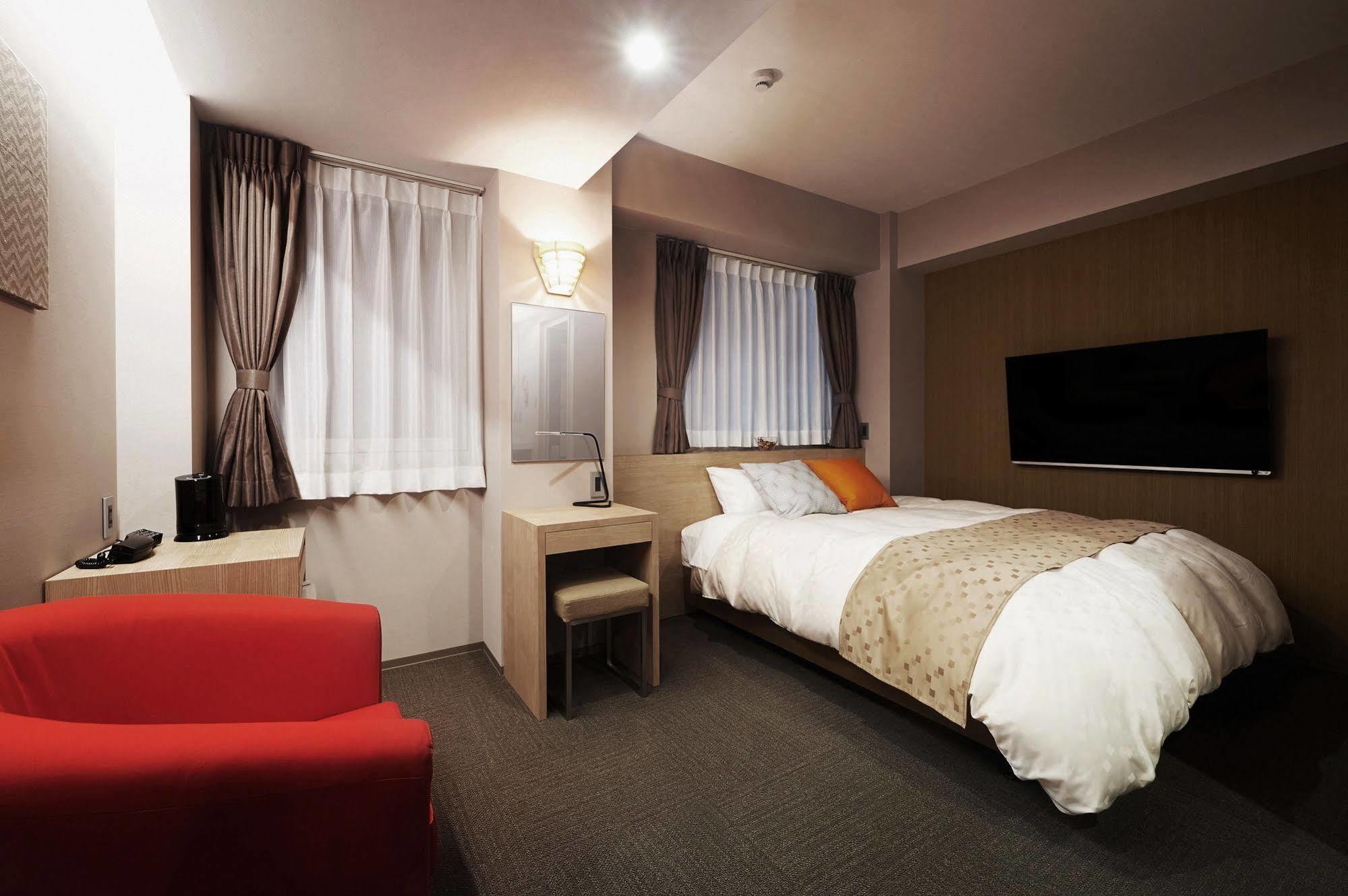 Okayama Square Hotel Plus Esterno foto